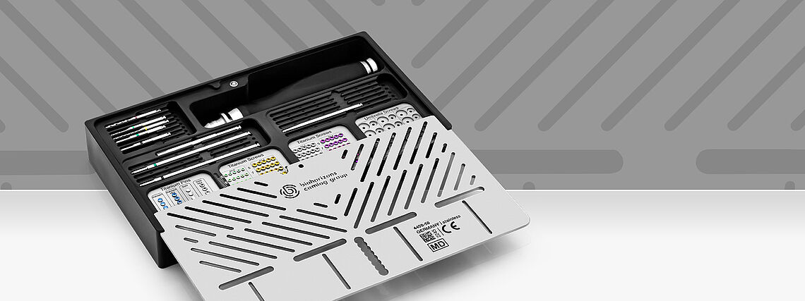 dev-os toolbox banner dev-os toolbox filled with bone fixation and membrane stabilization instruments in fron of grey background.