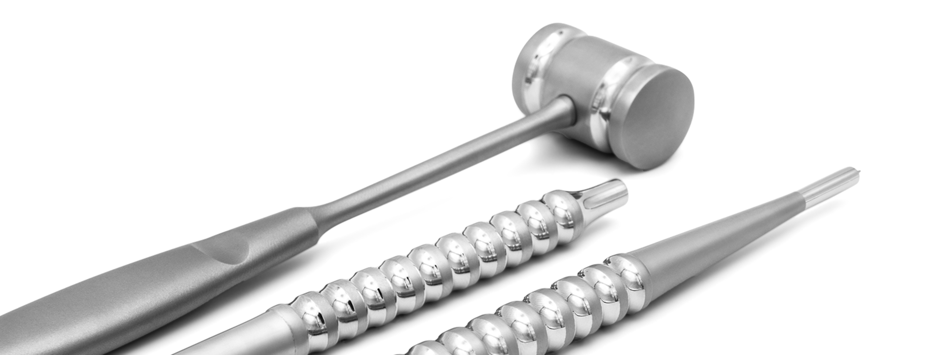 dev-os instruments next to each other: mallet, handle and pin punch